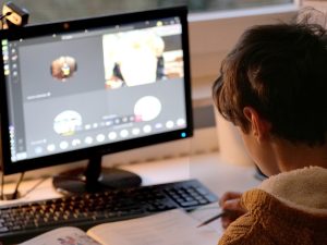 Child student attending a video conference